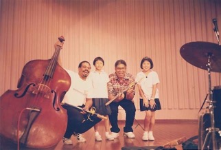 Great memory, Myself and Redd Holt after concert and seminar @ a primary school in Bedok, Singapore, 1994. At the time Redd was house drummer for Harrys Bar Boatquay. We would like to salute Eldee, Redd, Judy Roberts, Greg Fishman, Jeremy Monteiro, Jim Gelpy and all the other artists and people that supported live music in Singapore in the 90s!